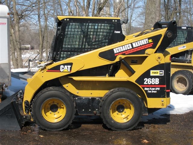 Neubauer Masonry CAT 268B skid steer loader — front view