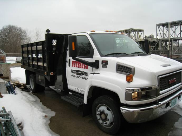 Neubauer Masonry GMC 4500 stake/flatbed truck